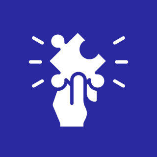 Hand holding a puzzle piece icon.